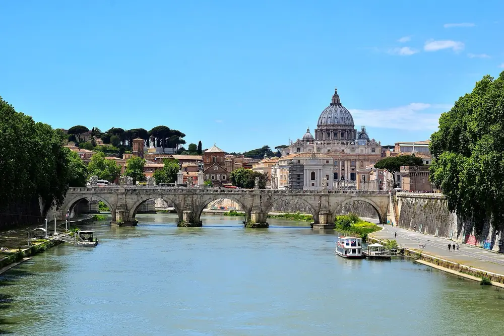 Ponte Sant'Angelo and the dome of St Peter's across the Tiber